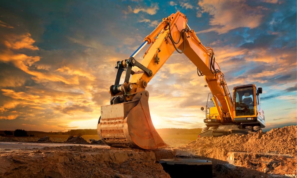 Agricultural tractor, excavator, and compact track loader ready for work